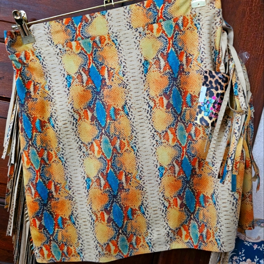 Cute fringed skirt. Runs little small